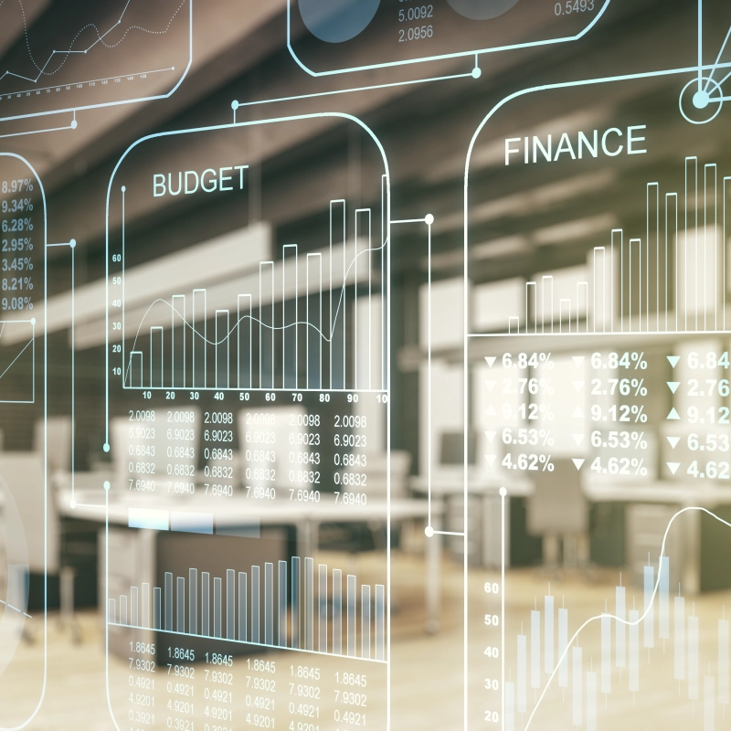 Transparente Finanzgrafiken vor moderner Büroumgebung. Transparente Finanzgrafiken vor moderner Büroumgebung.
